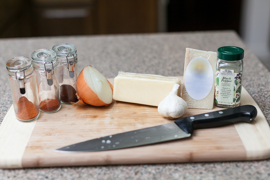 ingredients for spicy cheese pasta on stovetop