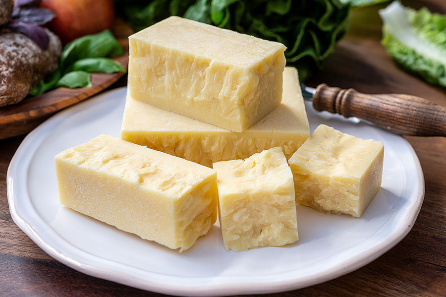 aged cheddar on a white plate