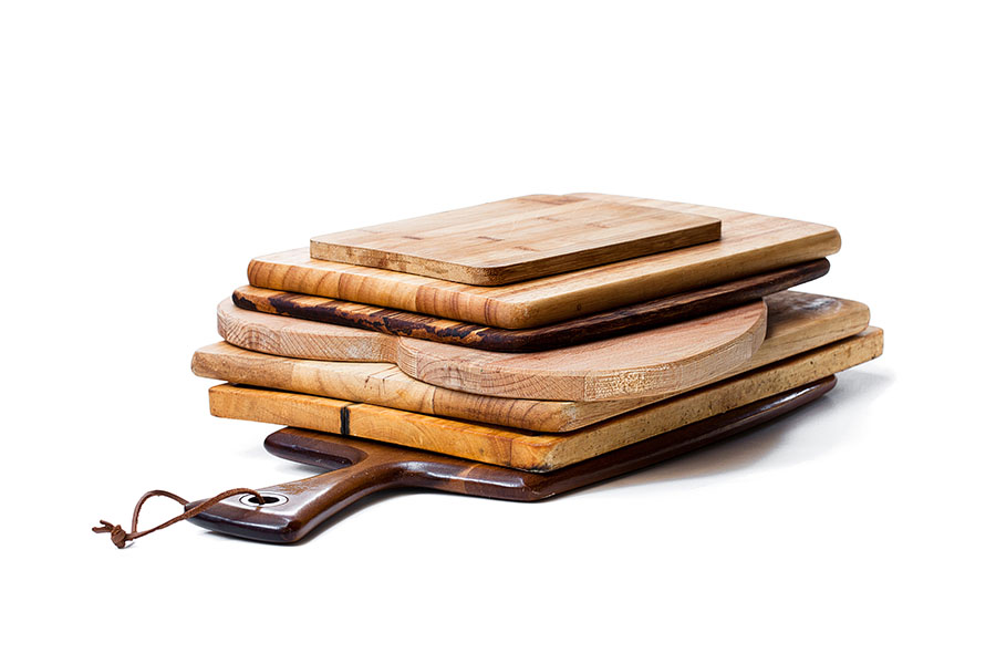 Stack of different types of charcuterie boards